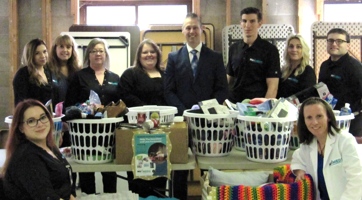 NuMedX Integrated Medical Clinic in Punxsutawney recently conducted a community project through the NuMedX Outreach Program to collect and provide basic necessities for homeless individuals and families in the Punxsutawney area.  Pictured are: (Front row L-R) Ashley Raybuck and Rachel Lucullo, CRNP; (Back row L-R) Victoria Kunselman; Cheryl Craft, Community Action, Inc. Community Services Supervisor; Amanda Martin; Crystal Thompson; Dr. William Reed, DC; Wesley Campbell; Kayla Reed; and Devan Penman.